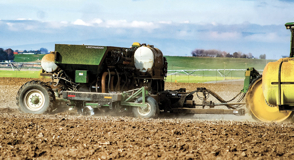 Lockwood 606 Air Cup Planter being used in field